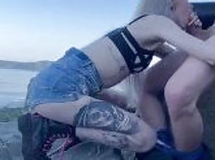 Blonde babe gives amazing head on public beach