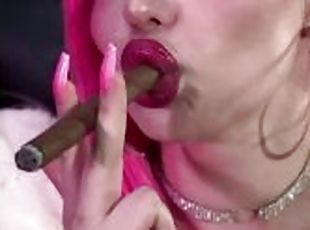 Pink haired Luvie Doll smoking cigar with her big juicy pumped up sucker lips and long nails in fur