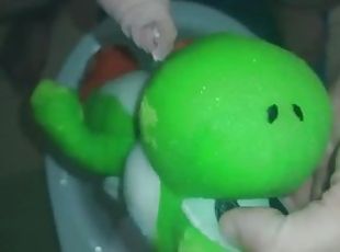 Small Yoshi dinosaur pee