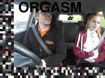 Ginger babe gives driving instructor a bright orgasm