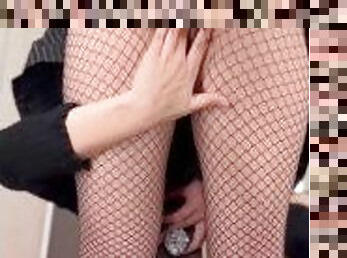 Bent over in fishnets and a skirt fingering myself in the public fitting room ????