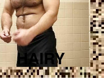 HAIRY MUSCLE BEAR FLEXING