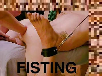 Hanging in a palisade bondage, fisting, teasing, anal stretching and pegging from femdom