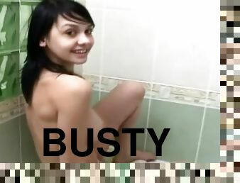 Busty teen goes horny in the bath