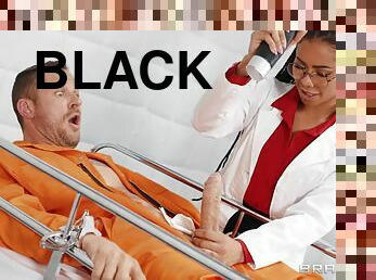 A black nurse wanks a prisoner's big white cock before taking it vaginally