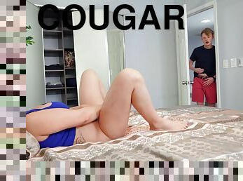 Blonde-haired cougar with big tits fucks her stepson in bed