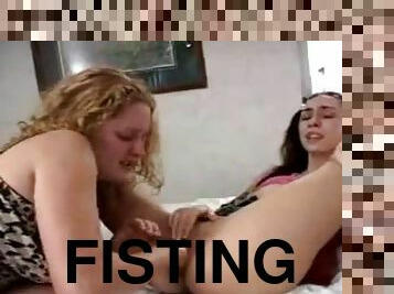 Two girls fisting