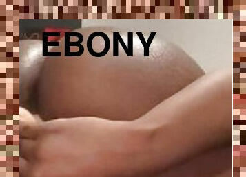 Ebony masturbating