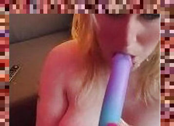 Playing with my tits and sucking a Dildo