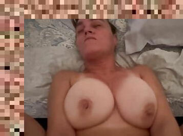 Mature mom with big boobs gets her pussy pounded good and filled with cum