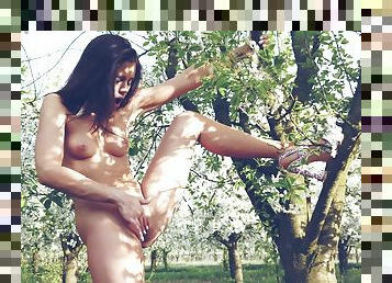 Outdoor fun under the apple tree in sensual XXX outdoor play