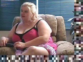 Blonde bbw milf enjoying a smoke on the couch