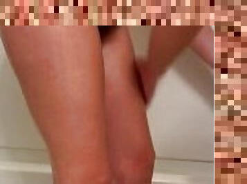Hairy MILF shaves legs for first time in 3 months in hotel bathroom at the beach