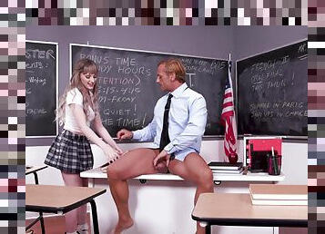Schoolgirl makes out with her teacher and fucks in the classroom