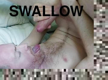 Swallowing a big load of cum