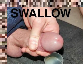 Extreme close up, huge thick load of cum transferred into a cup and swallowed