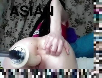 Asian fingering pussy with dildo