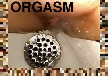 Throbbing clit orgasm in shower