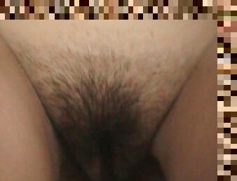 Hairy babe is pissing with pleasure