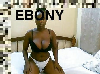 Pretty ebony with big tits masturbates on camera