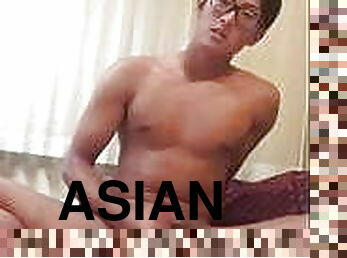 Asian stud masturbates dick