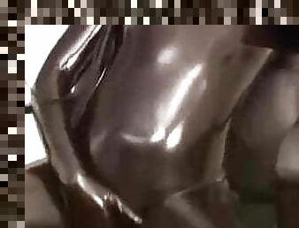Latex fetish doll wears inflatable rubber ball mask