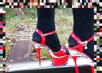 Lady L sexy walking with extreme red high heels.