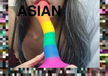 cute asian babe sucks her dildo wishing it was you