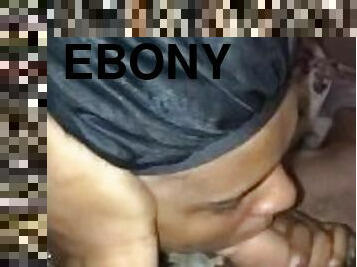 Ebony giving head in her bonnet