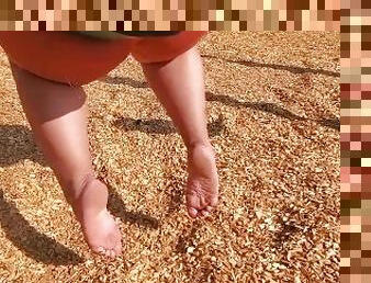 BBW Relaxing At Park Barefoot On A Swing