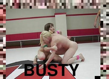 Wrestling busty dyke fights against small boobs babe
