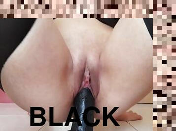 Sexy girl rides her black dildo