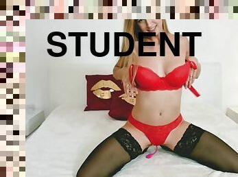 Cute student playing with a dildo
