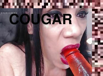 Glamour cougar loves dildo