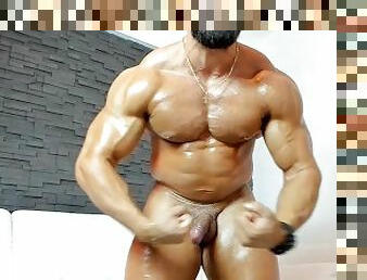 hot ripped hunk jerki and flexing hard massive muscles oil and shoot massive load