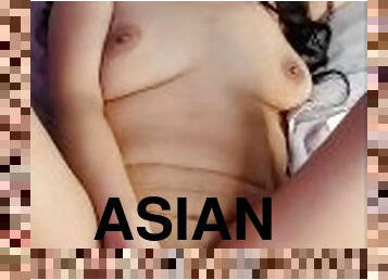 Asian slut  fucking her self rough.