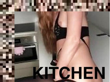 Beauty masturbates in the kitchen