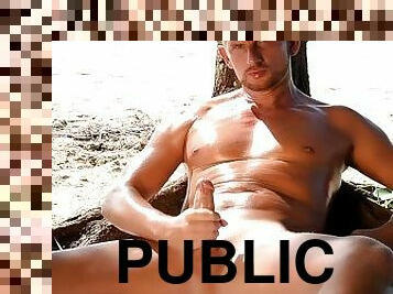 muscle stud jerking off on a public beach