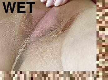 Nice pussy view through wet soaked pantyhose. Horny pussy with no panties
