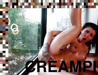 Creampie in front of the window