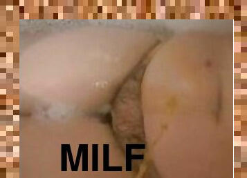 Milf slut loves getting pissed on