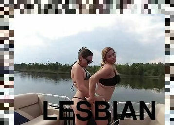 Lesbian ladies Sinn Sage and Coco Vandi licking on boat
