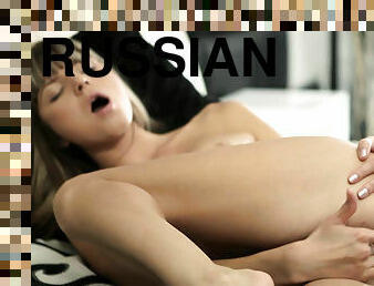 Russian slim Gina Gerson caresses her pussy