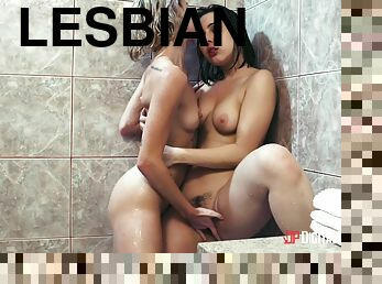 Lesbian cuties wash their pussies and tits with tongues