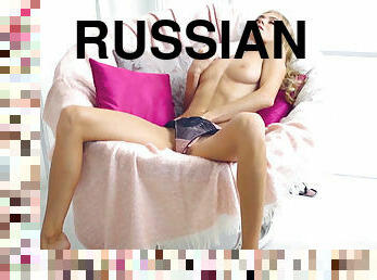 Blond Hair Girl Russian babe in desirable lingerie fingers her slit