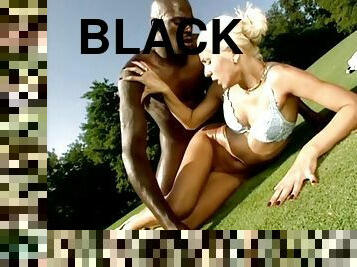 Black dick fucks a blonde on the golf course