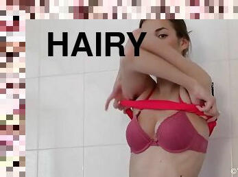 Gorgeous hairy Halmia takes a soapy bath before masturbating