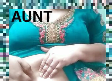 Big tits desi aunty in dress showing cleavage