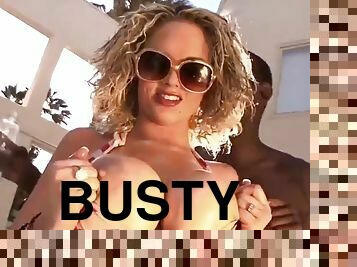 Busty blonde fucks outdoors in a bikini