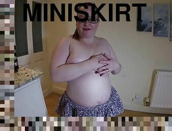 Strips in miniskirt